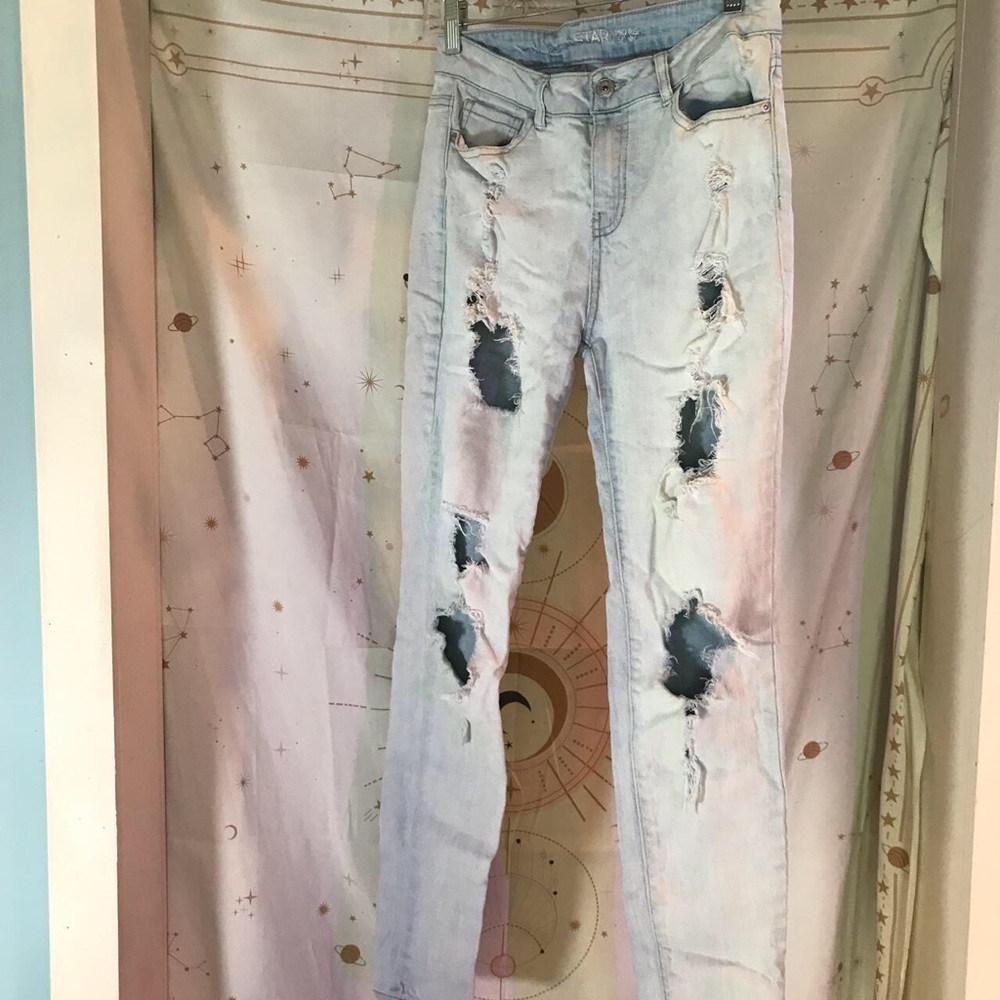 Distressed ripped jeans